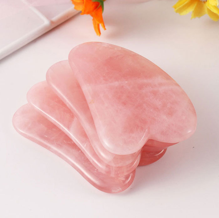 Natural pink crystal v-shaped scraping board
