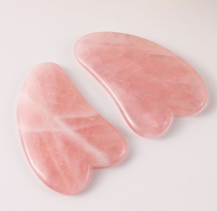Natural pink crystal v-shaped scraping board