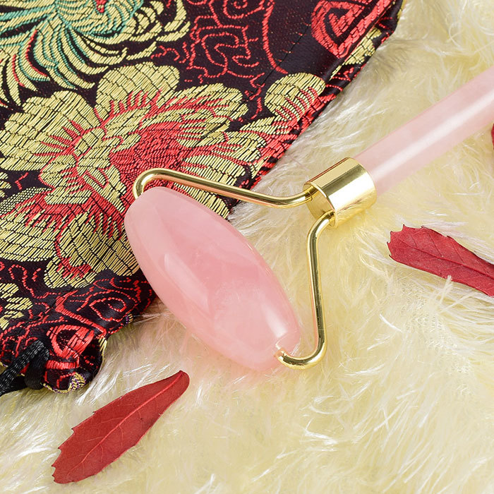 Natural pink crystal beauty massage roller
