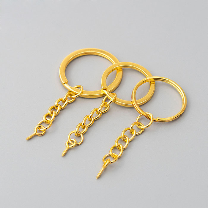 Gold-plated key chain with sheep eye studs