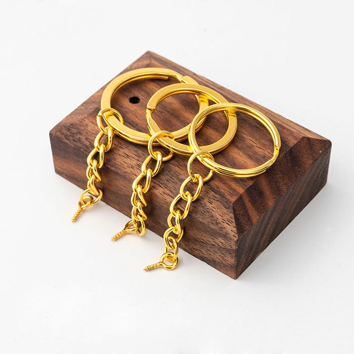 Gold-plated key chain with sheep eye studs