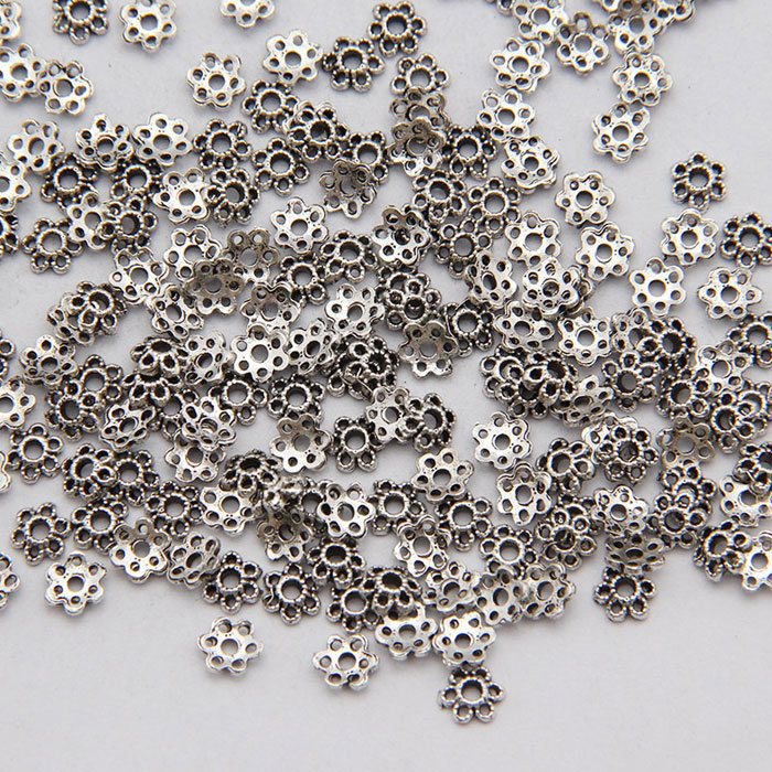 Exquisite six-petaled torus spacer