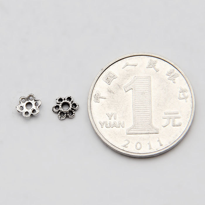 Exquisite six-petaled torus spacer