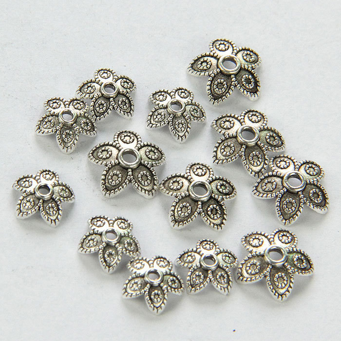 Five-petal outturned torus spacer accessory