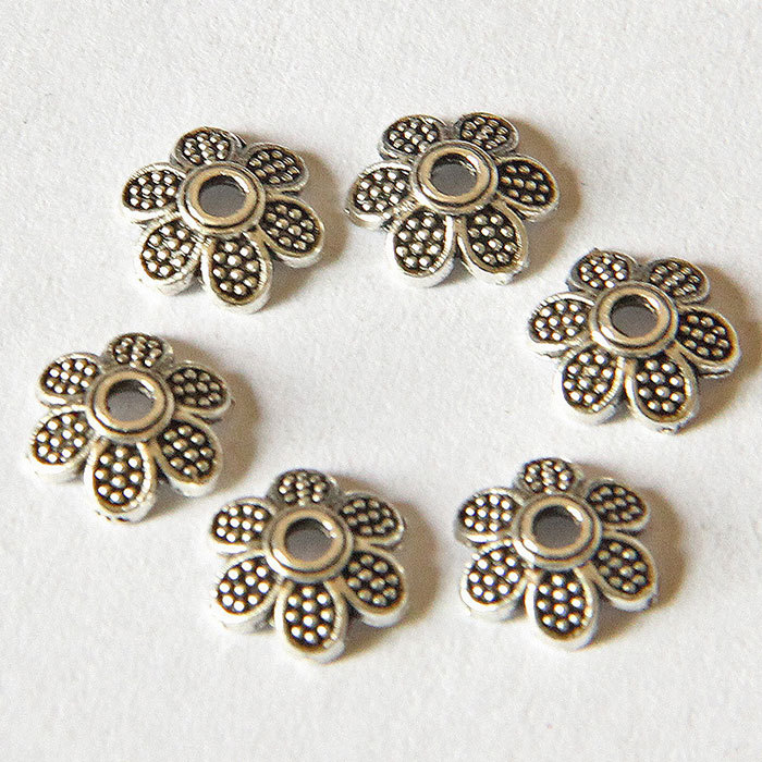 Six-petaled torus spacer accessory