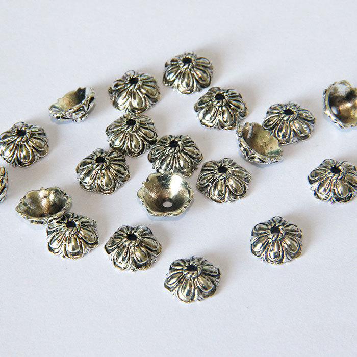 Six-petaled metal  torus spacer accessory