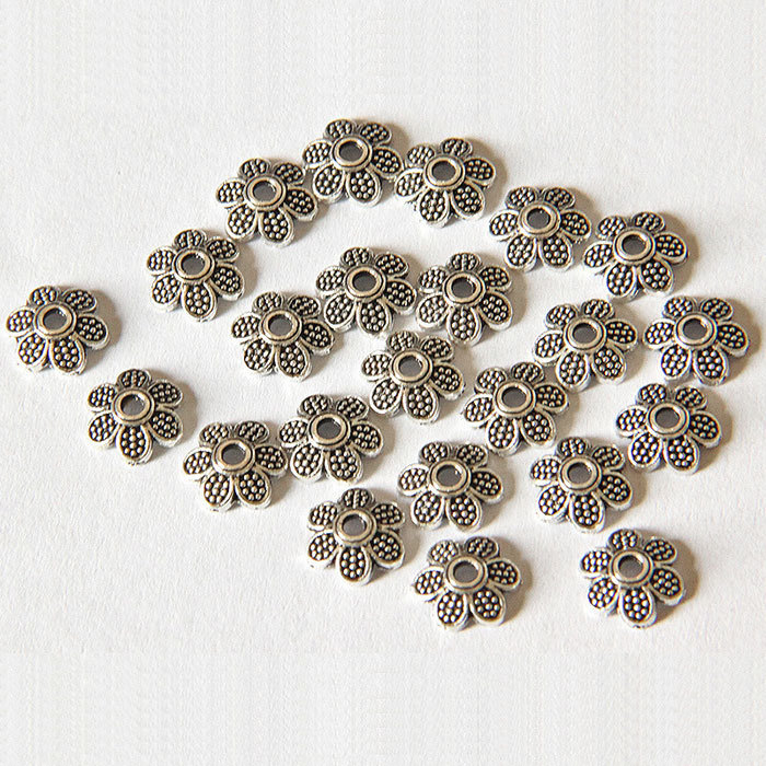 Six-petaled torus spacer accessory