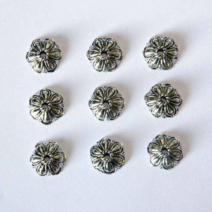 Six-petaled metal  torus spacer accessory