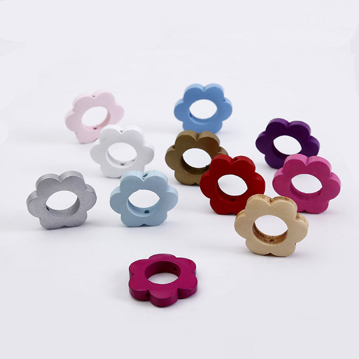 Colored hollow plum blossom wooden beads