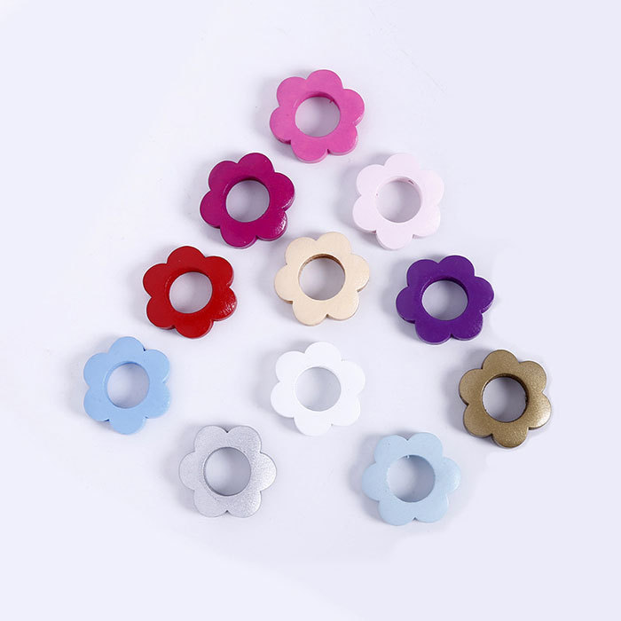 Colored hollow plum blossom wooden beads