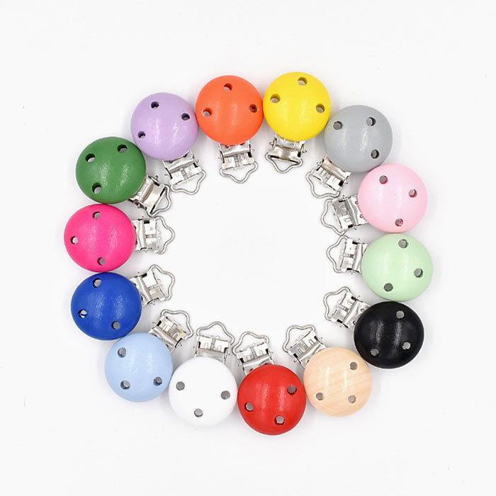 Colored wooden pacifier clips