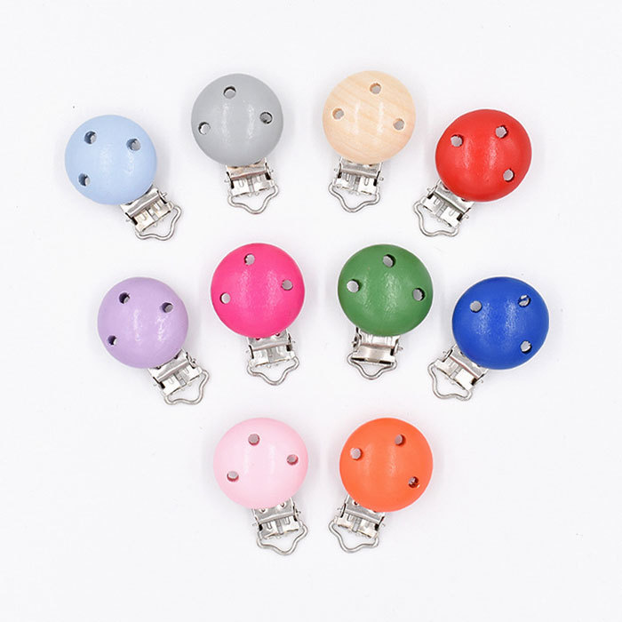 Colored wooden pacifier clips