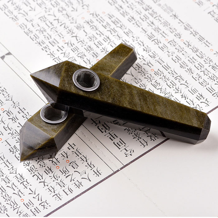 Golden obsidian pipe