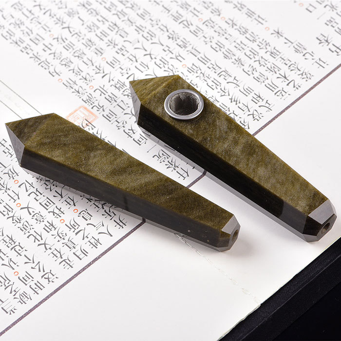 Golden obsidian pipe