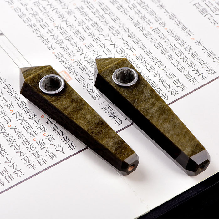 Golden obsidian pipe