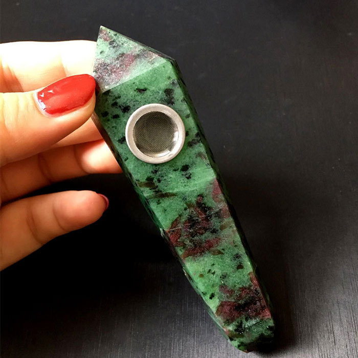 Red and green stone pipe