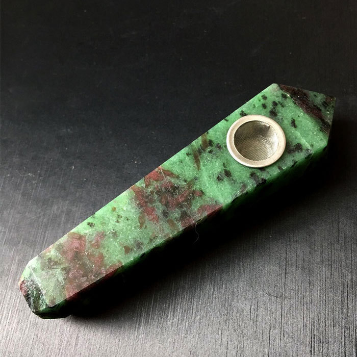 Red and green stone pipe