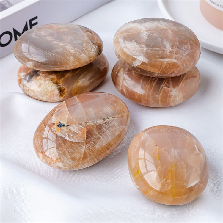 Natural orange moonstone massage stone