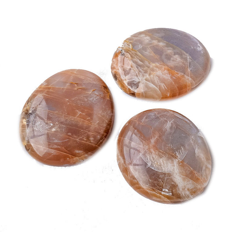 Natural orange moonstone massage stone