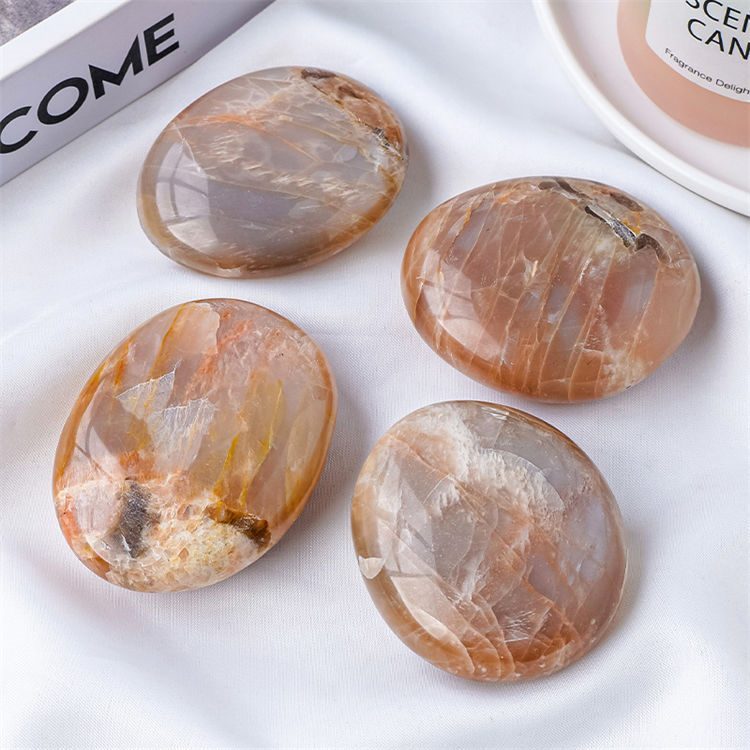 Natural orange moonstone massage stone