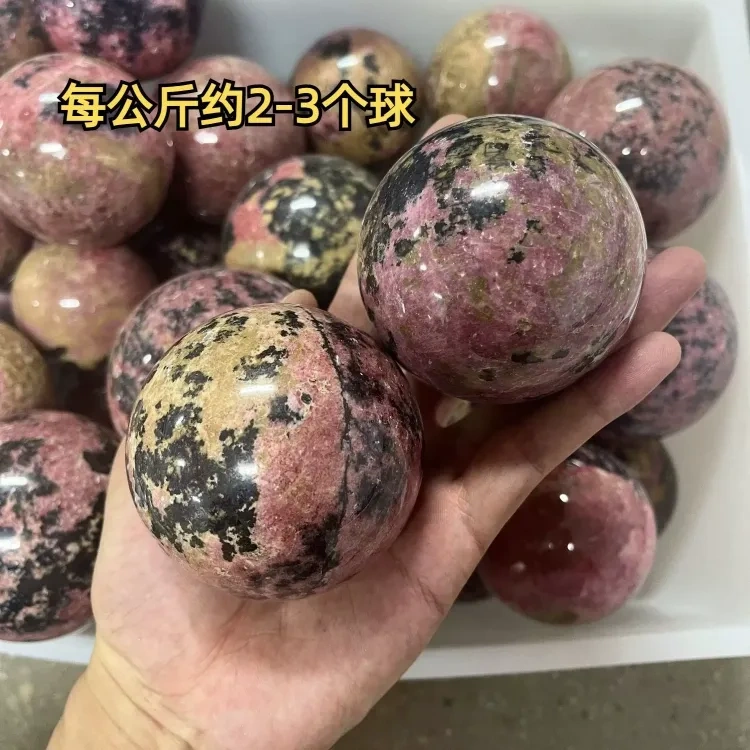 Natural crystal Rhodonite sphere 1kg