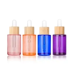 Custom 1 Oz 2 Oz Glass Bottle With Dropper Empty 50ml 30ml Flat Shoulder Glass Dropper Bottle Pink Clear Serum Bottles