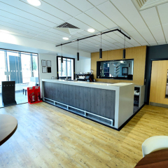 Sleek Design Corian and Oak Wood Cafe Bar Counter with Led Wall