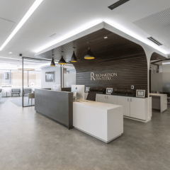 Coal Grey and White Color L Shape Corian Reception Desk and Cupboard