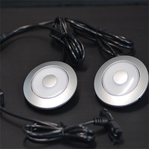Double led reading lamp with touchable brightness control