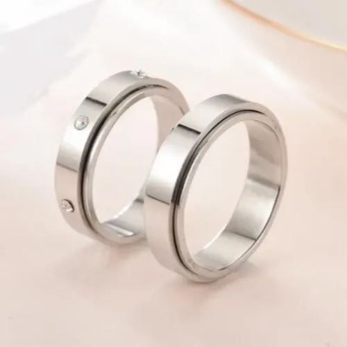 RTM2869 Elegant Light Plate Inlaid Diamond Pair Ring Rotatable Couple Jewelry Design