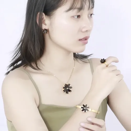 NTM3109 Daisy Charm Stainless Steel Bracelet, Earrings Necklace Set for Women Floral Jewelry Collection