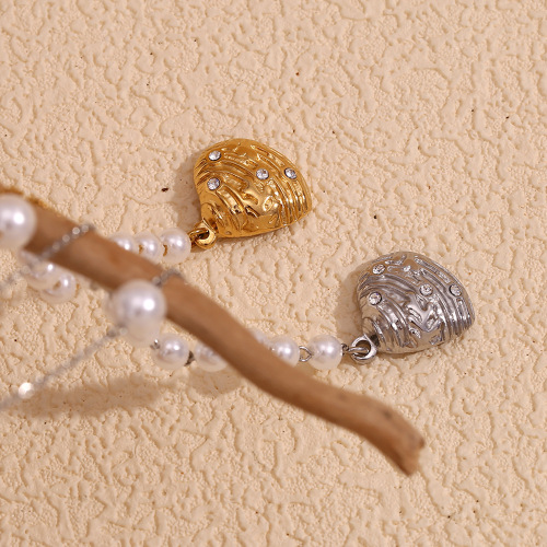 NTSMJ402 18K Gold Plated Stainless Steel Asymmetrical Necklace for Women with Diamond Studded Shell Pendant