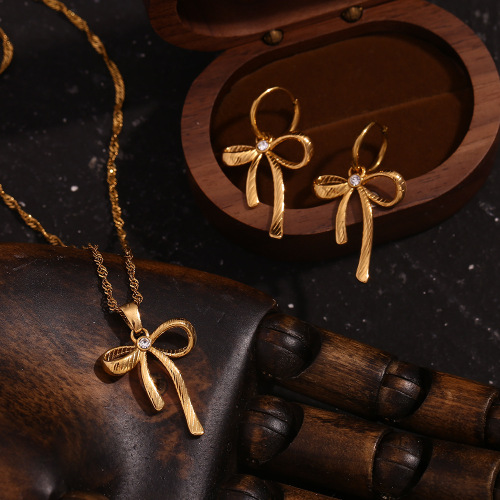 NTSMJ40 18K Gold Plated Stainless Steel Bow Pendant Necklace and Sweet Earrings Set with Crystals