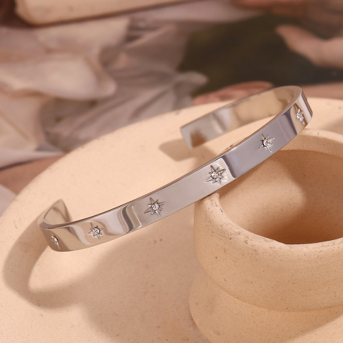 GTSMJ15 Stainless steel plated with 18K gold open eight-pointed star zircon bracelet