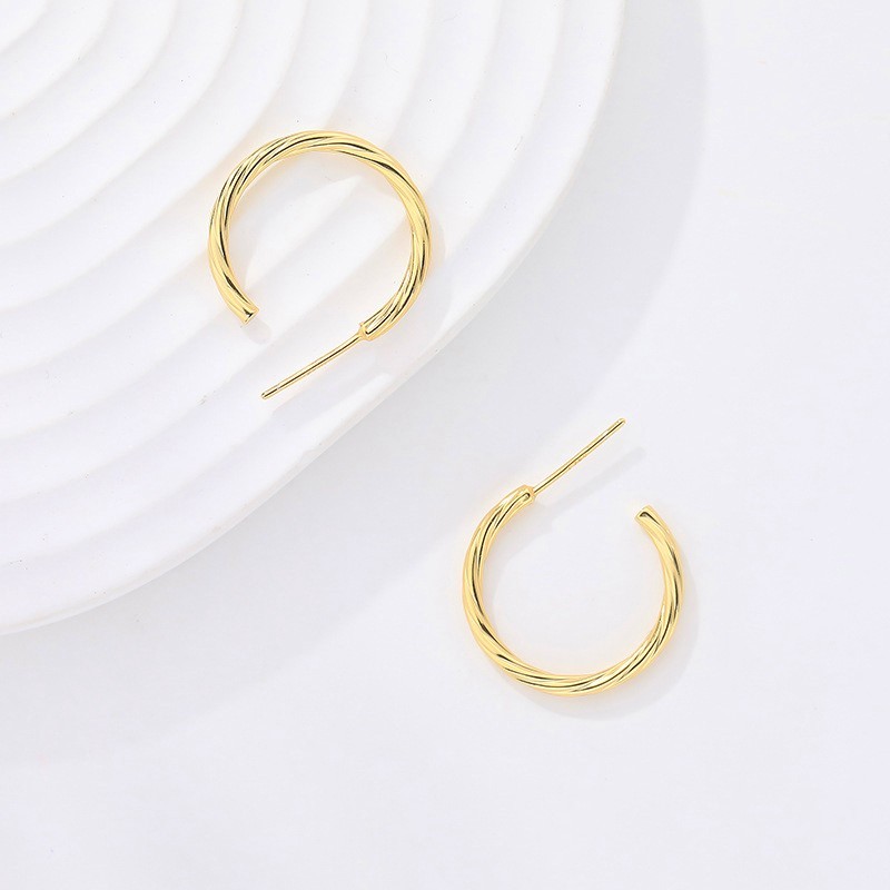 Twist Hoop Earrings In Sterling Silver