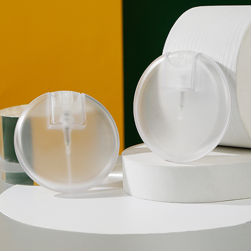 25ml 丸型カードスプレーボトル、PETG ポータブル旅行保湿マウススプレーディスペンサー。