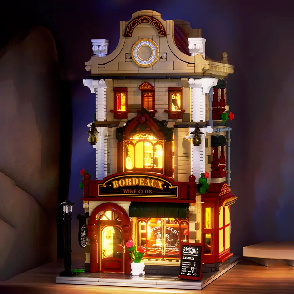 The Wekki Bordeaux Wine Club emits warm yellow lights at night.