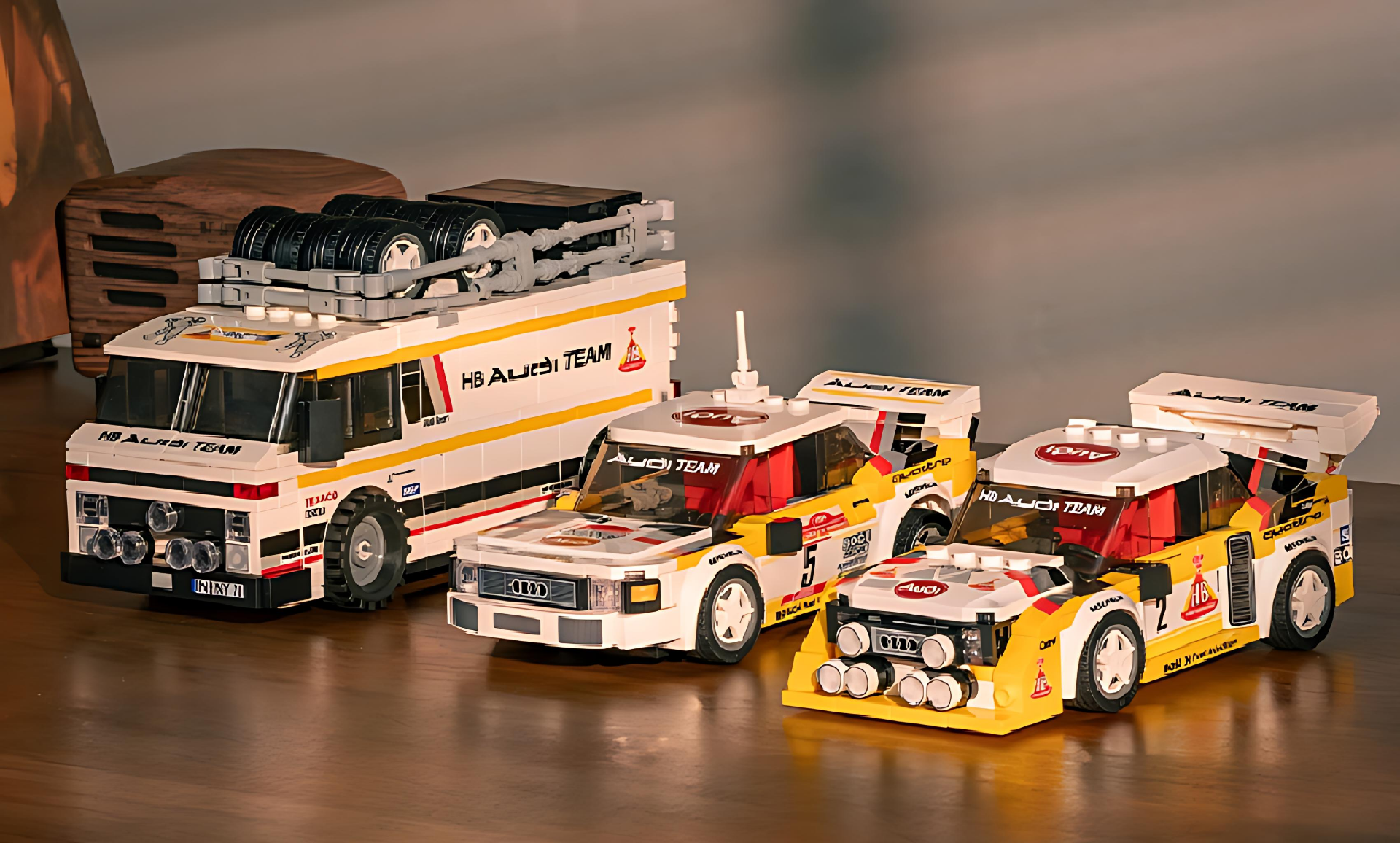 The three cars of the PowerBlock PB8812 Audi WRC Rally Team are placed together.