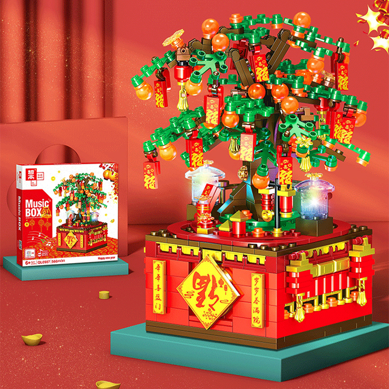 ZHEGAO QL0987 Season Spring Festival Music Box Happy New Year Building Blocks 566±pcs Bricks from China Delivery.