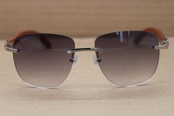 Cartier Rimless T8300680 Original Wood Sunglasses in Gold Brown Lens