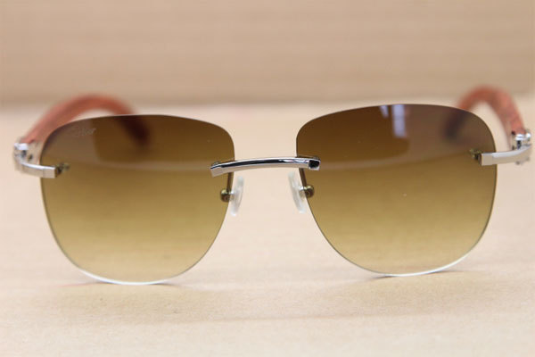 Cartier Rimless T8300680 Original Wood Sunglasses in Gold Brown Lens