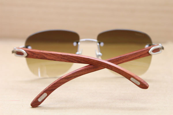 Cartier Rimless T8300680 Original Wood Sunglasses in Gold Brown Lens