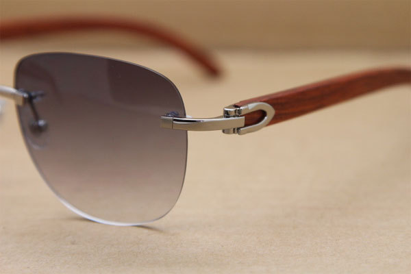 Cartier Rimless T8300680 Original Wood Sunglasses in Gold Brown Lens