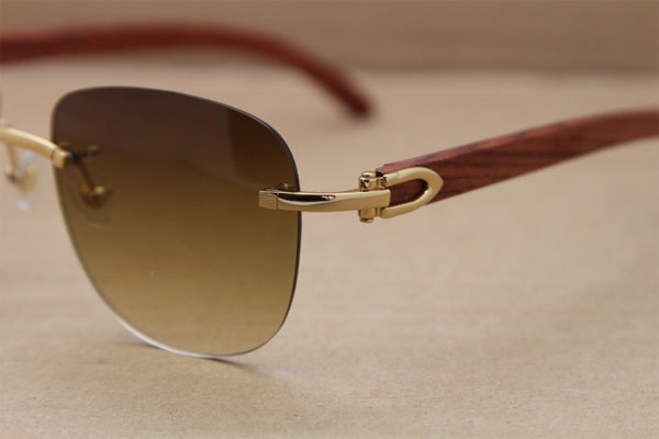Cartier Rimless T8300680 Original Wood Sunglasses in Gold Brown Lens