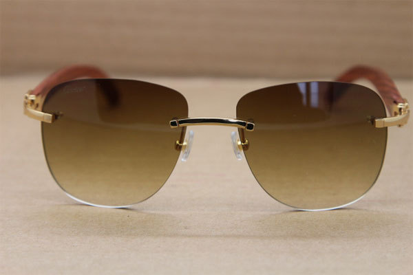 Cartier Rimless T8300680 Original Wood Sunglasses in Gold Brown Lens