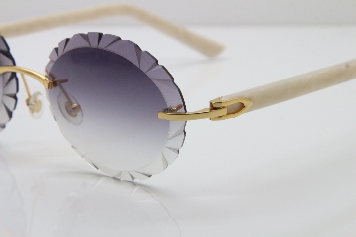 Cartier Rimless T8200761 Sunglasses In Gold Gray Carved Lens