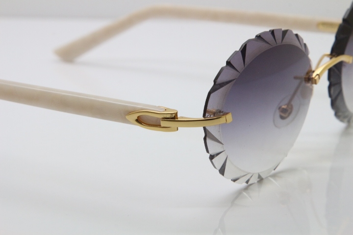 Cartier Rimless T8200761 Sunglasses In Gold Gray Carved Lens