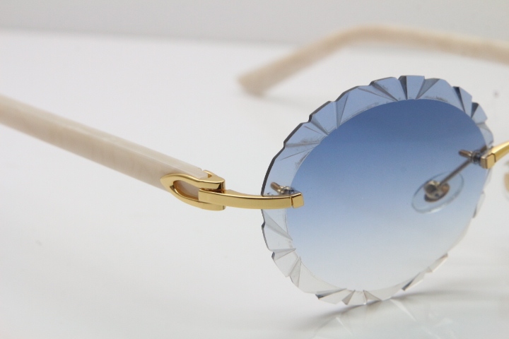 Cartier Rimless T8200761 Sunglasses In Gold Blue Carved Lens