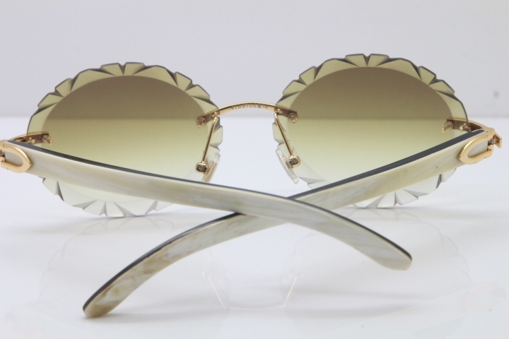 Cartier Rimless Original White Inside Black Buffalo Horn T8200761 Sunglasses in Gold Brown Carved Lens