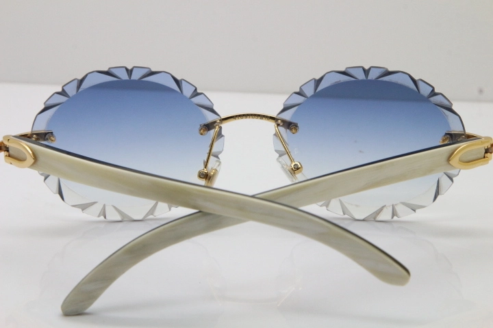 Cartier Rimless Original White Inside Black Buffalo Horn T8200761 Sunglasses in Gold Blue Carved Lens